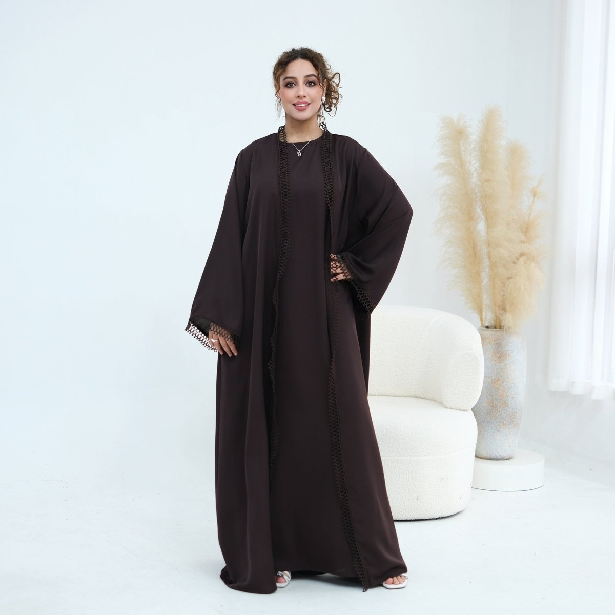 Side view of batwing sleeves on matte opaque open abaya