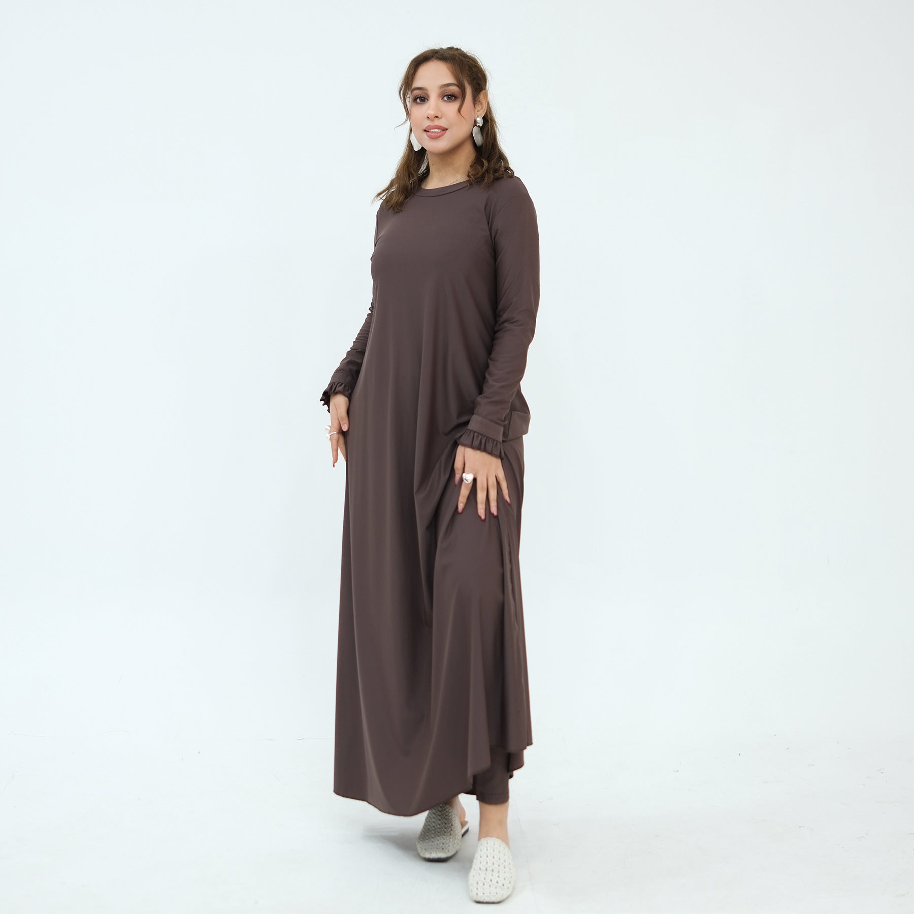 Modest swimwear set flat lay showing all three pieces included