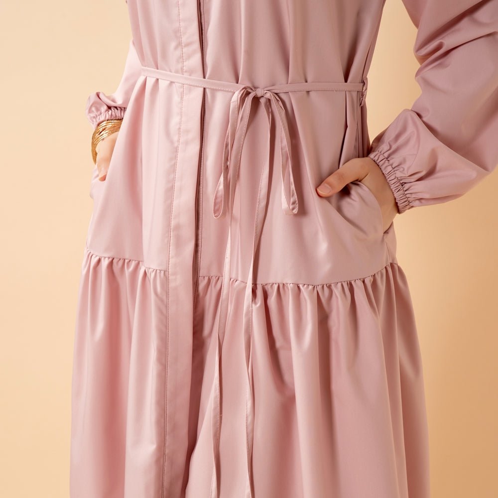 Back view of A-line trench maxi abaya in neutral colour
