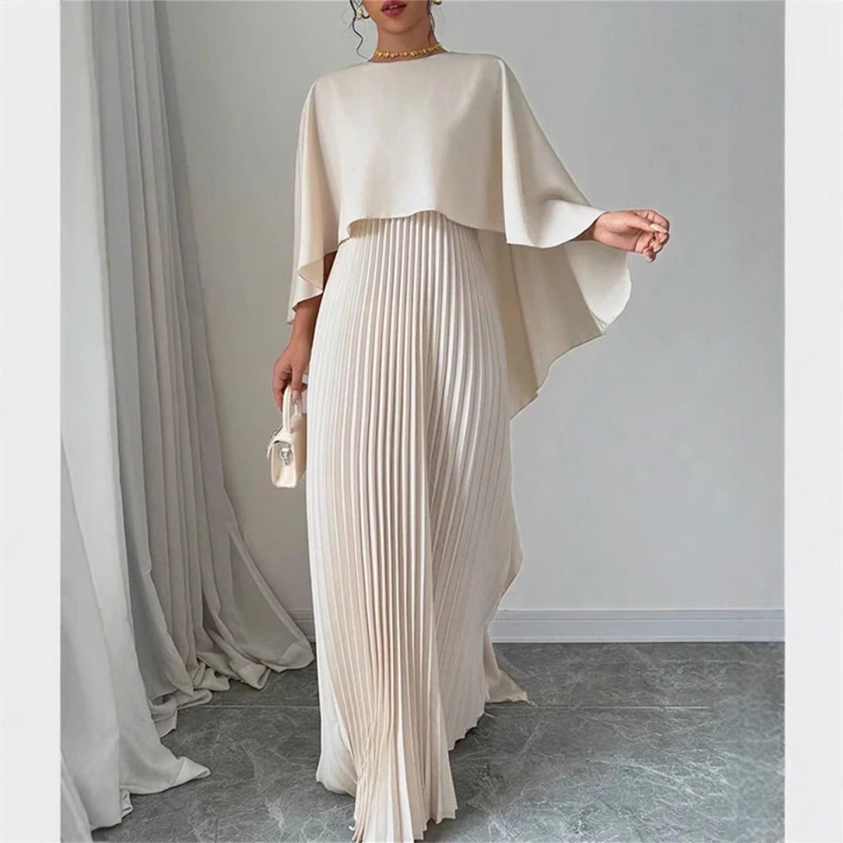 Bat Sleeve Pleated Maxi Dress | Cream White Cape Dress with Dramatic Bell Sleeves. (MA241) - Mariam's Collection