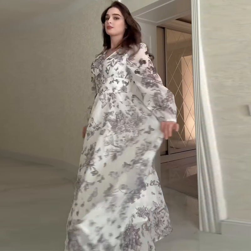 Botanical print modest dress with flowing skirt and fitted bodice