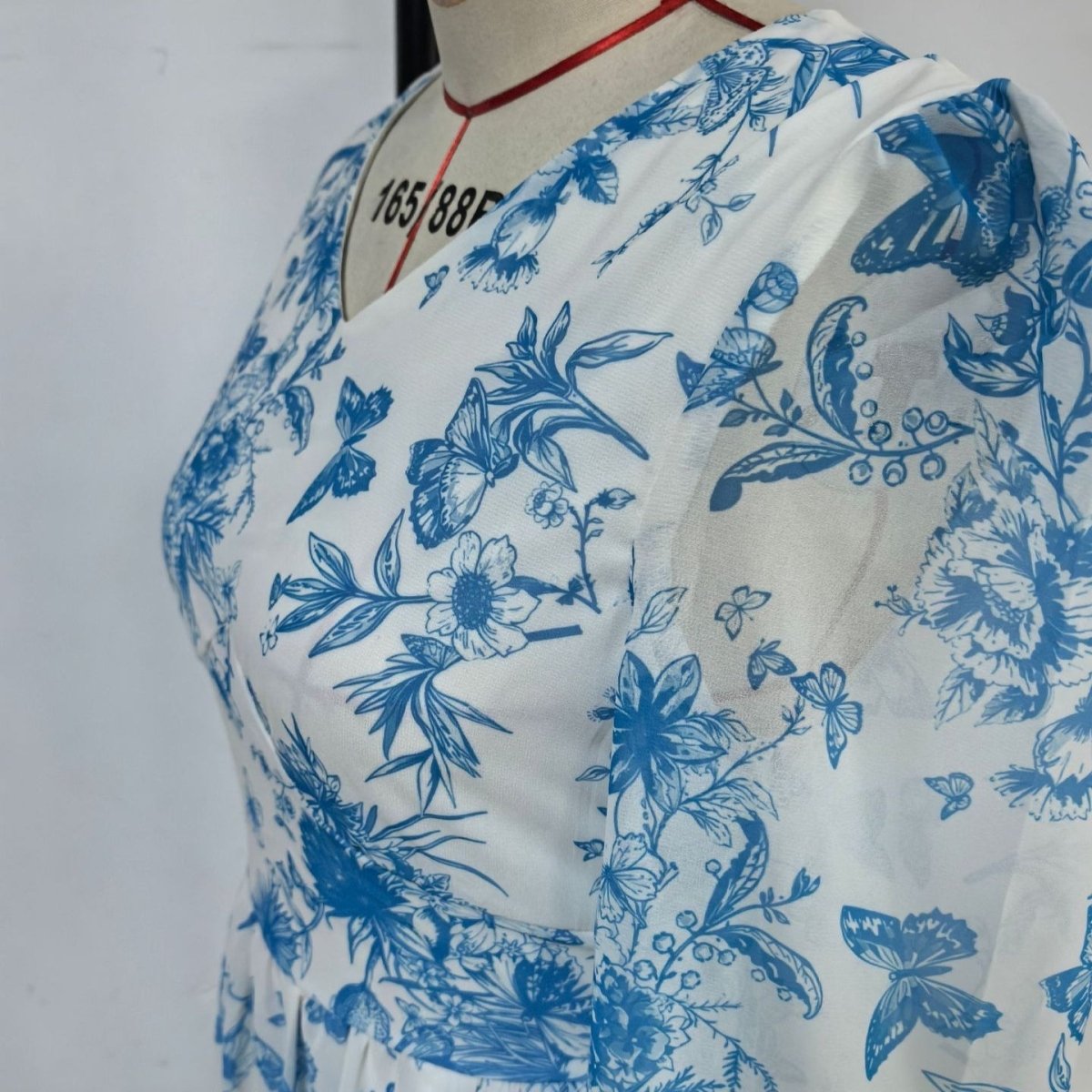 Modest empire waist gown with delicate floral botanical pattern
