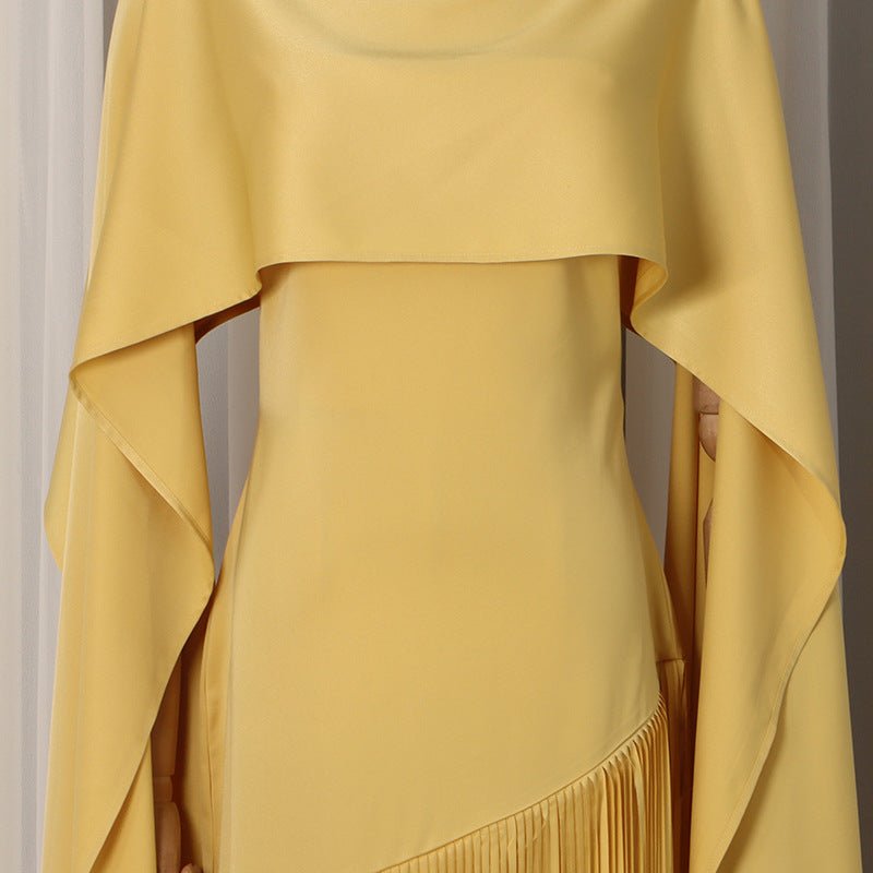 Full-length view of golden fringe hem party dress for formal occasions