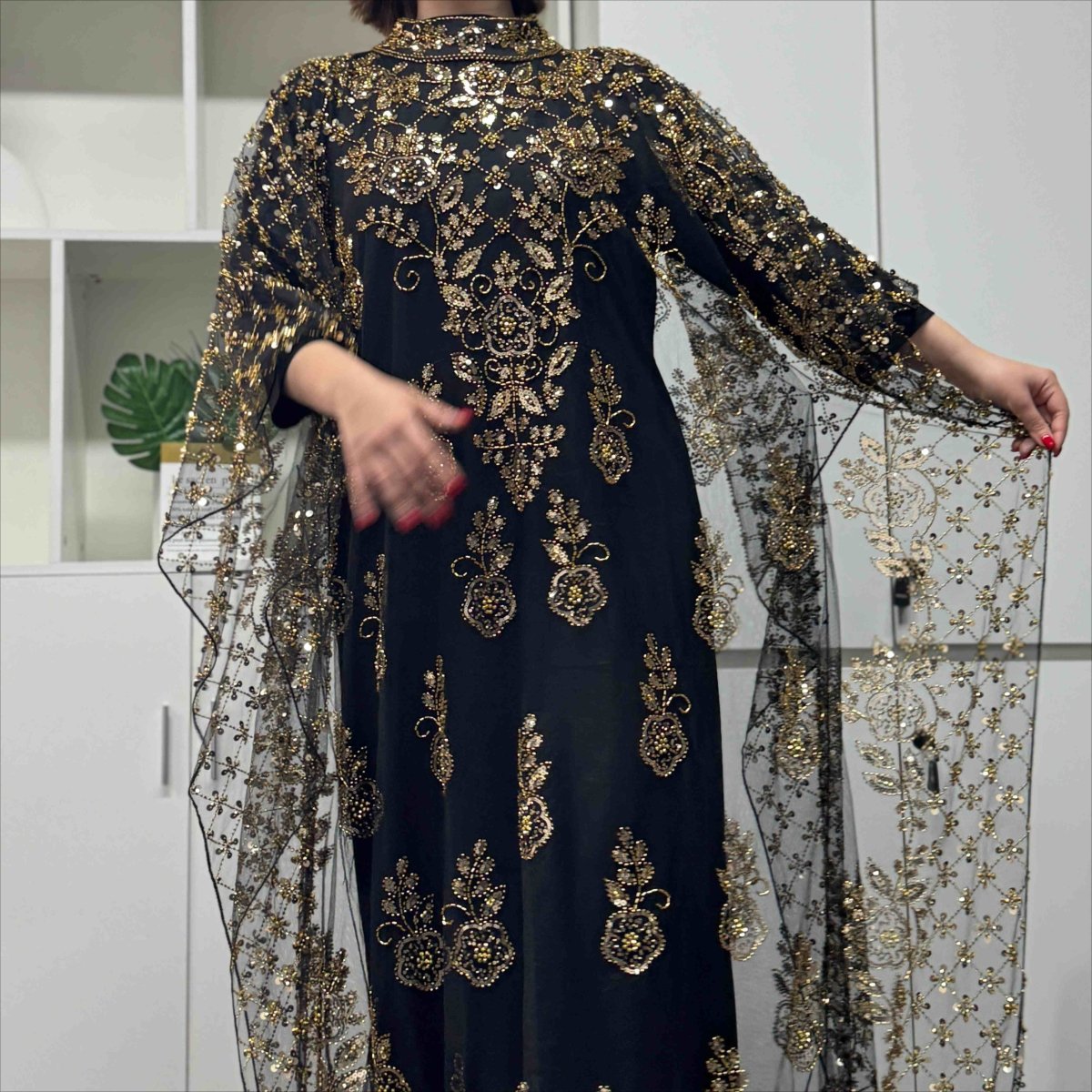 Hand-embellished tulle cape with scattered crystal gems and beading