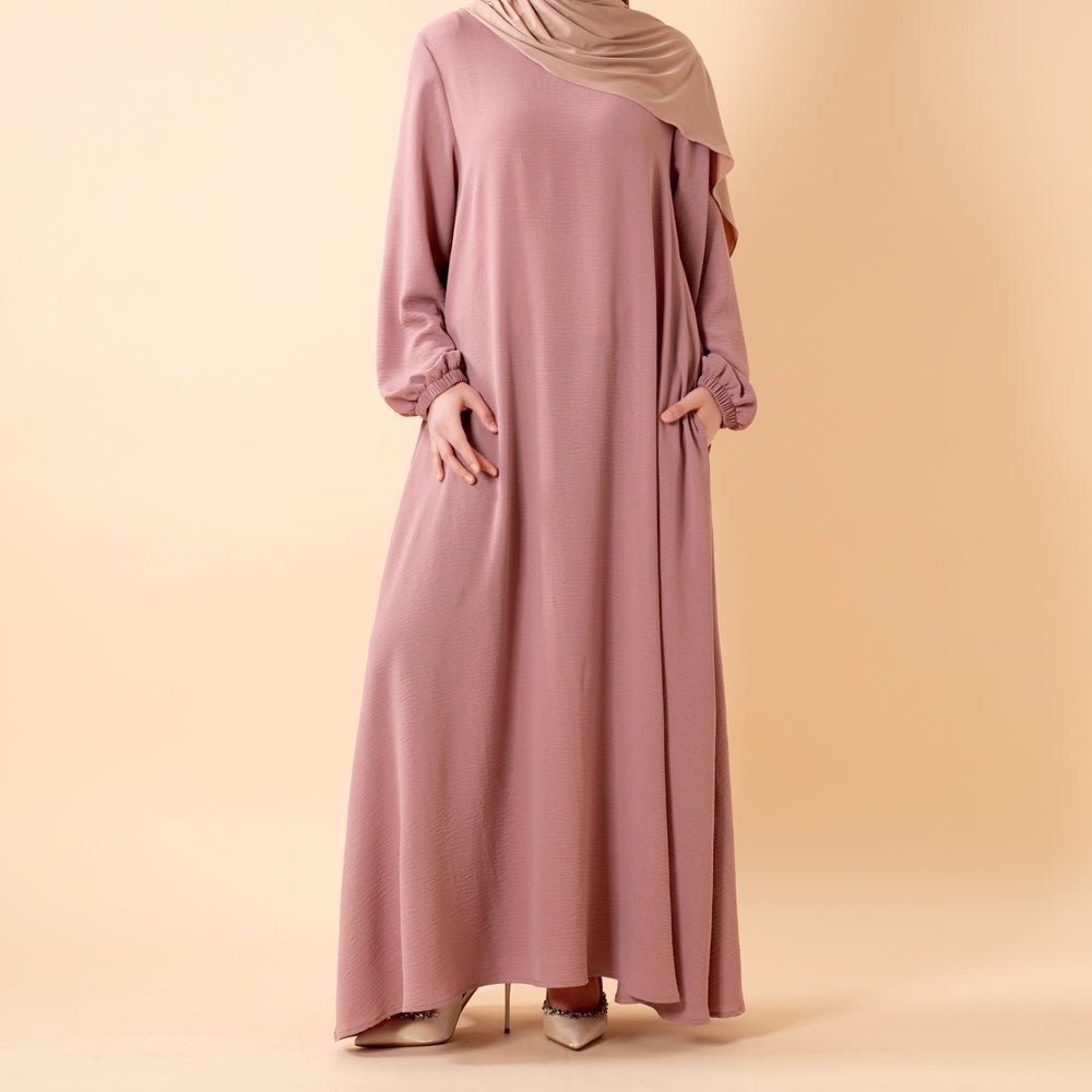 Detail of lightly fitted bodice on casual crepe maxi dress