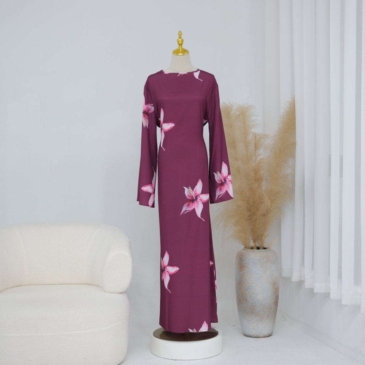 Close-up of opaque full-coverage fabric lining on floral maxi dress