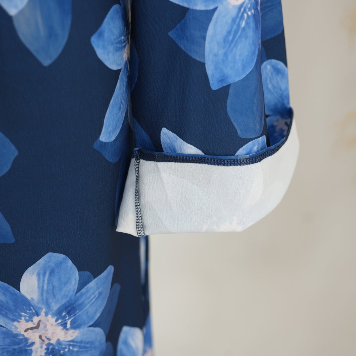 Sleeve cuff hanging naturally at rest