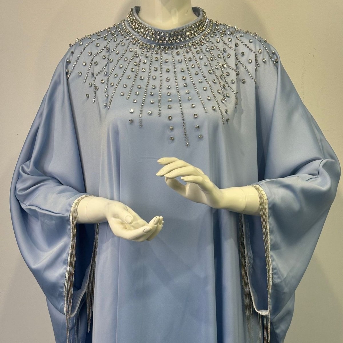 Modest evening kaftan with scattered rhinestone gems on satin fabric
