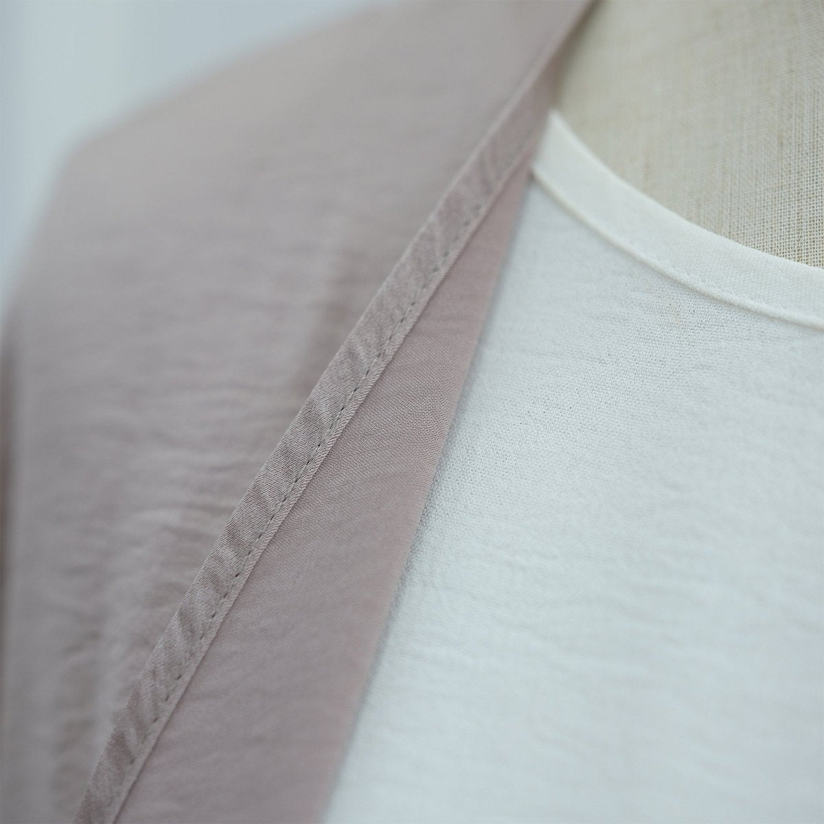 Hem detail showing clean uninterrupted line without pockets