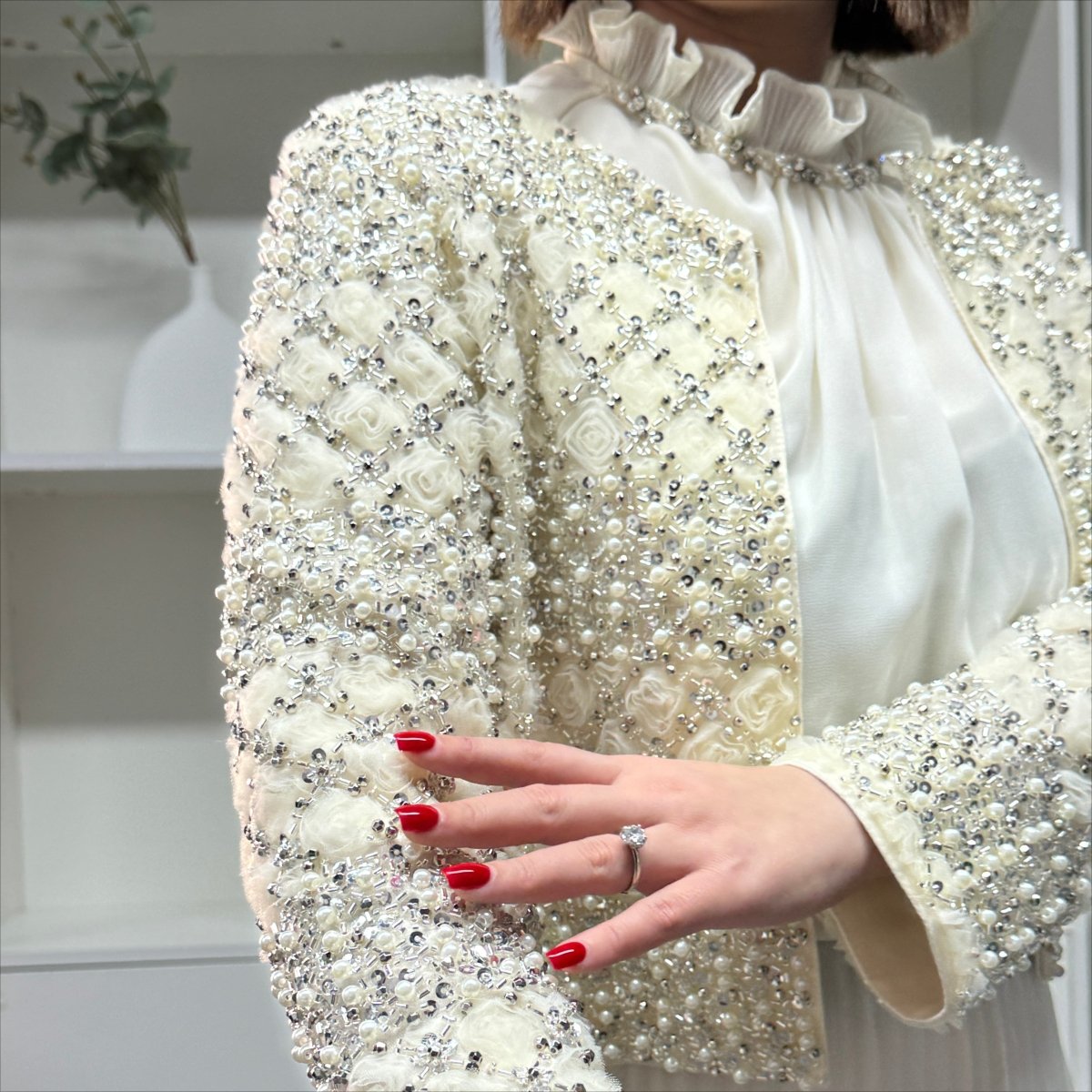 Ruffled high neckline of pleated abaya dress