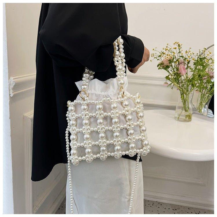 MAC125 Hollow Hand woven Beaded Pearl Bag