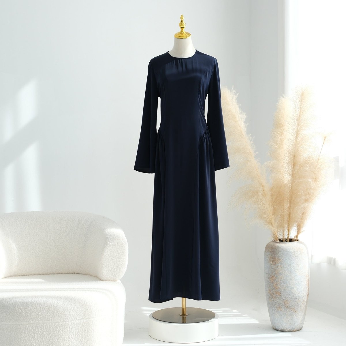 Waist and bodice close-up showing sculpted seams on nida abaya dress
