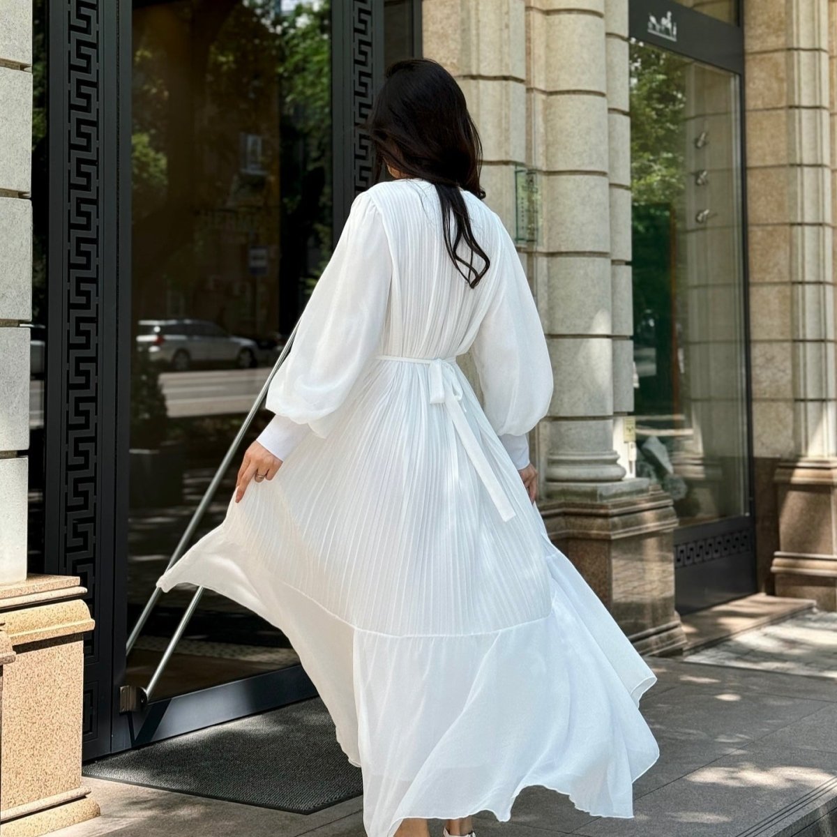 Modest maxi dress styled for formal occasion with soft swing silhouette