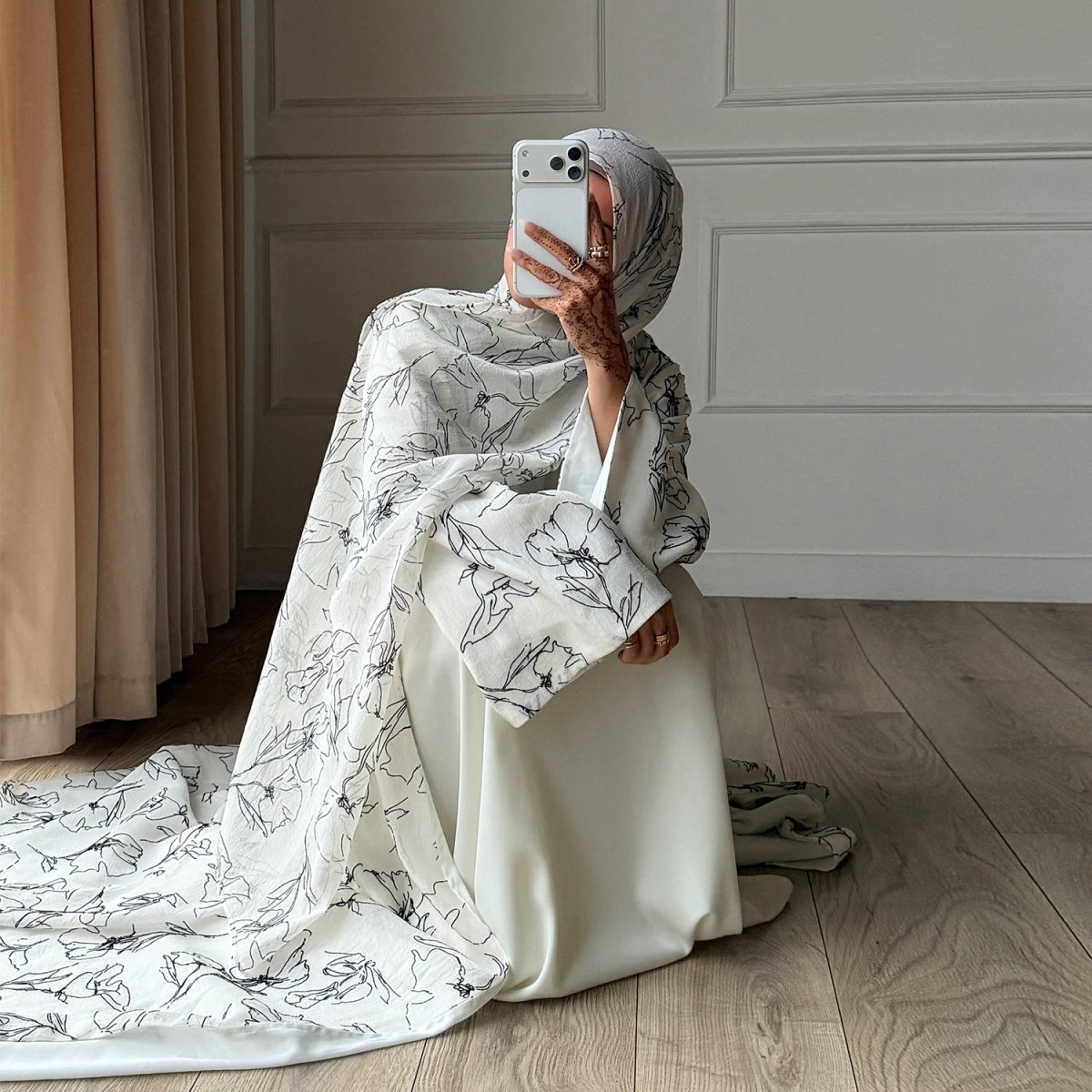 Double-layer cuff detail showing opaque inner lining on flared sleeve abaya