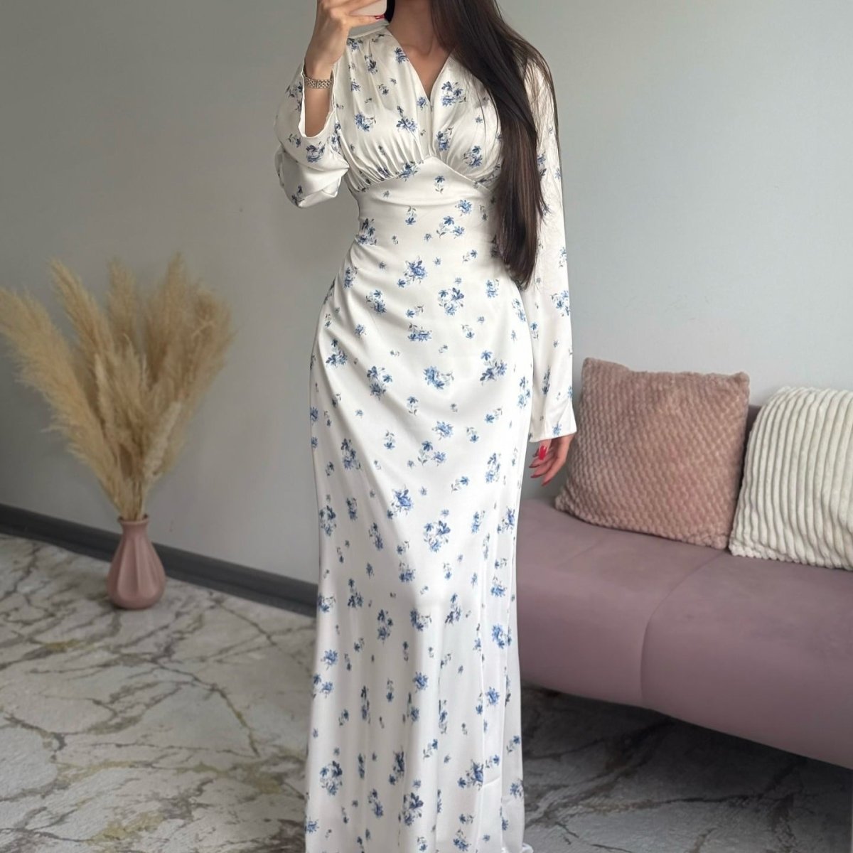 Full-length front view of ivory satin maxi dress with blue floral print