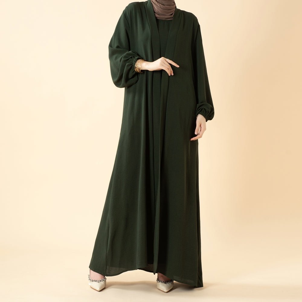 Solid colour open abaya worn for a polished everyday modest look