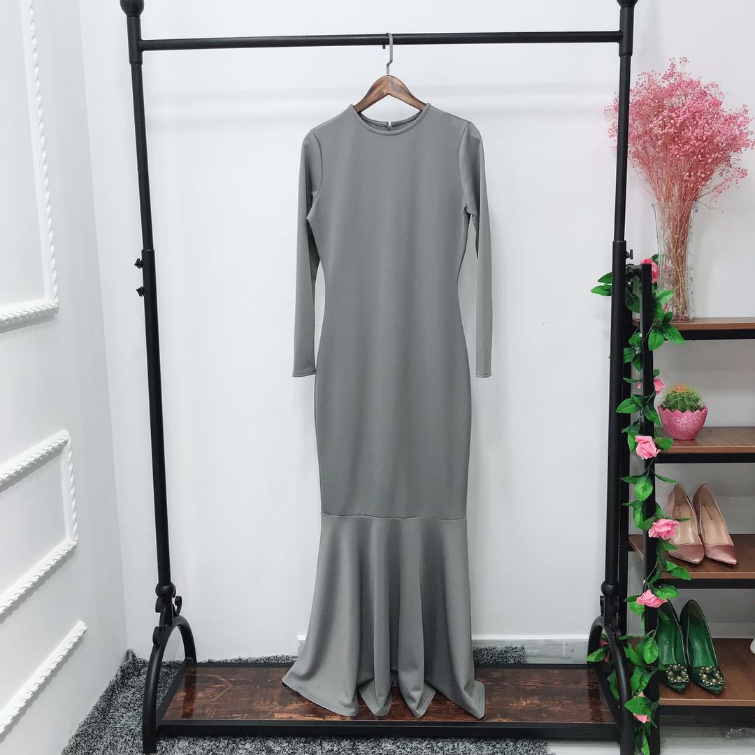 Mermaid hem dress styled as inner layer beneath open abaya