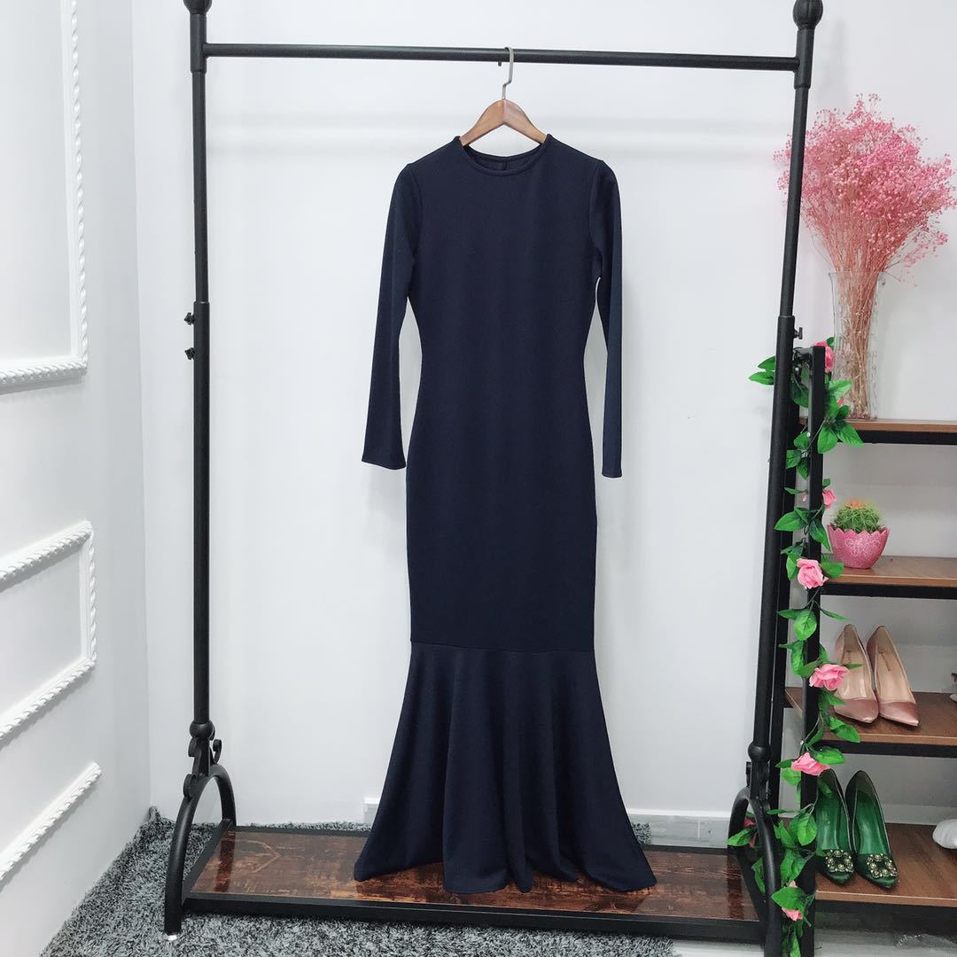 Full-length floor coverage of bodycon mermaid maxi dress in opaque stretch fabric