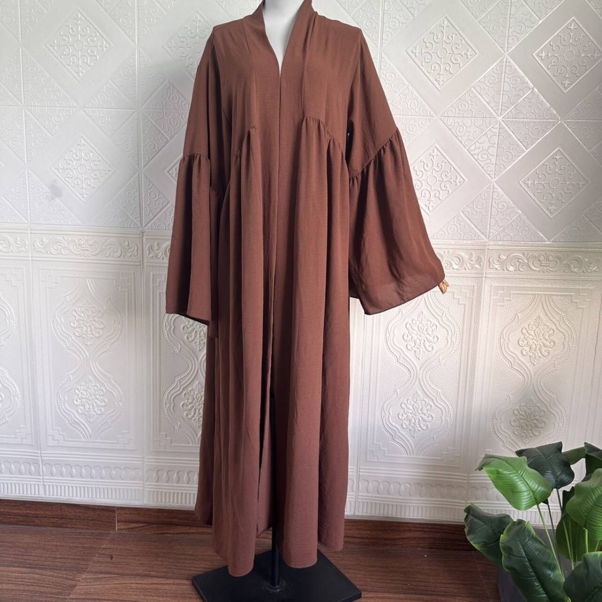 Tiered bell sleeve open abaya in dark blue with dramatic trumpet sleeves
