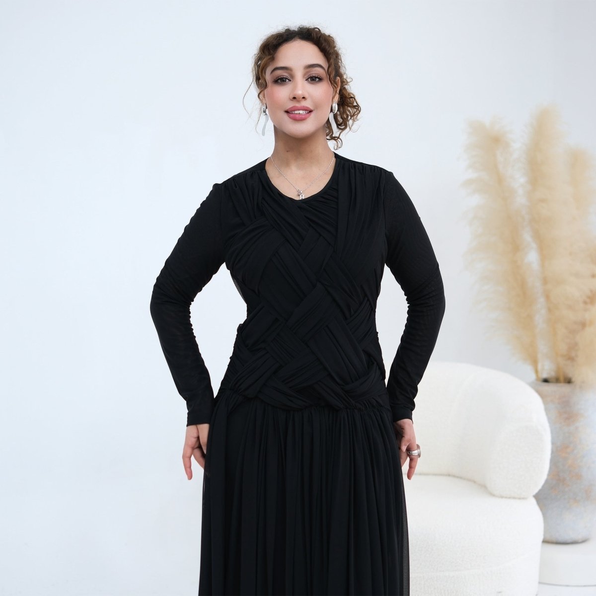 Three-quarter view of woven lattice bodice and fitted sleeve detail