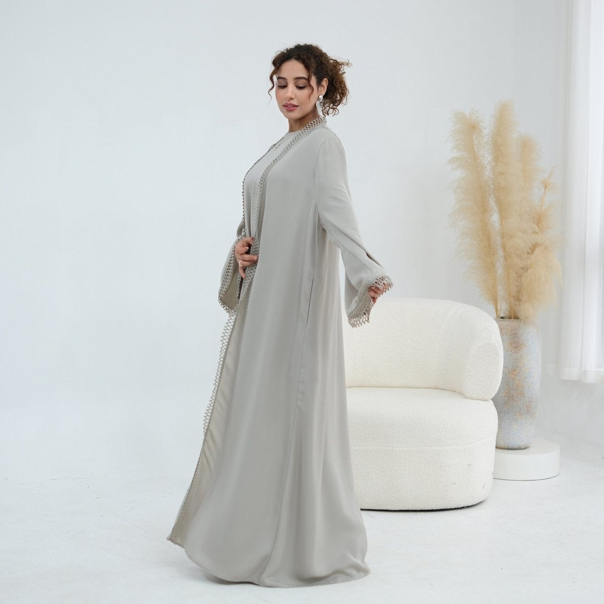 Matte fabric drape close-up showing smooth structured finish of abaya set