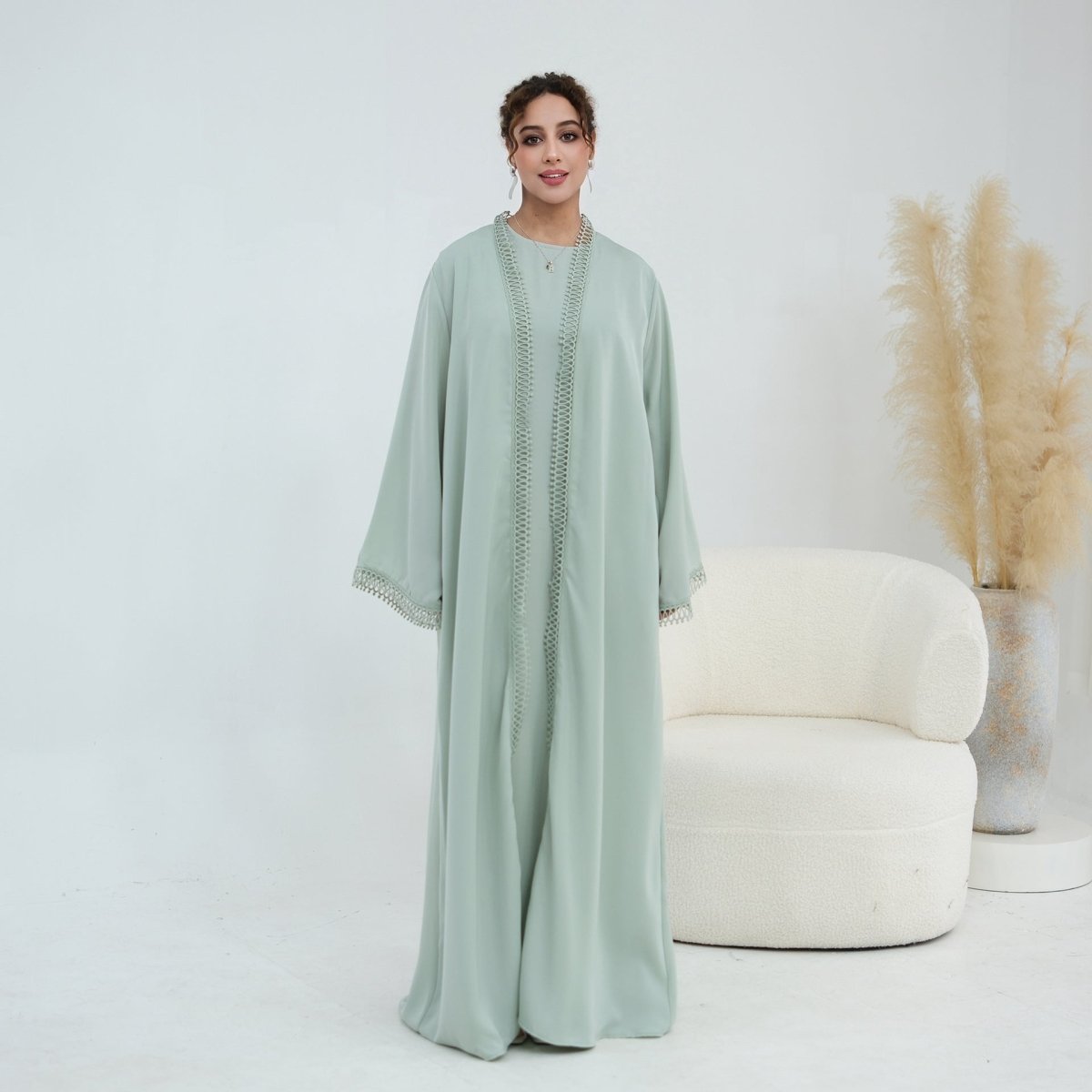 Fabric texture swatch showing soft opaque matte finish of abaya material