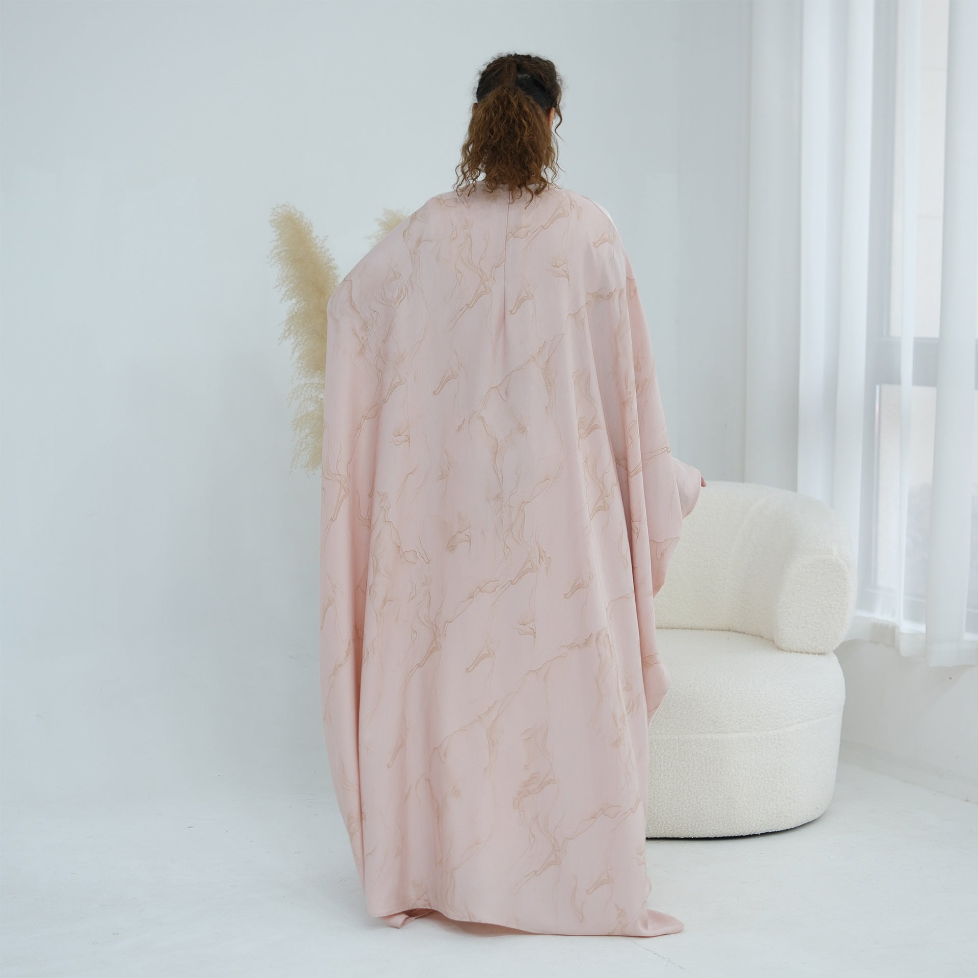 Unbelted relaxed silhouette of batwing sleeve abaya maxi dress