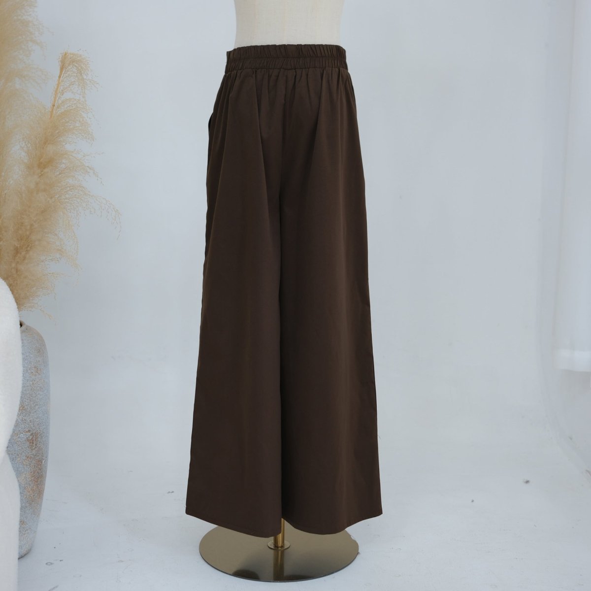 Cinched silhouette with self-tie waist cord on modest co-ord top