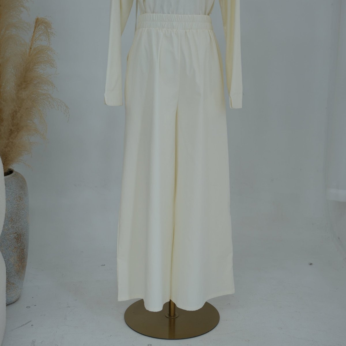 Soft opaque matte fabric texture close-up on modest co-ord set