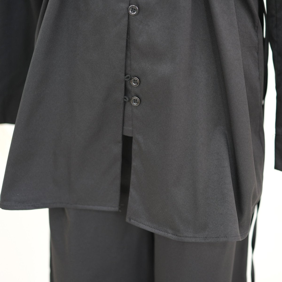 Structured drape detail on matte modest two-piece trouser set
