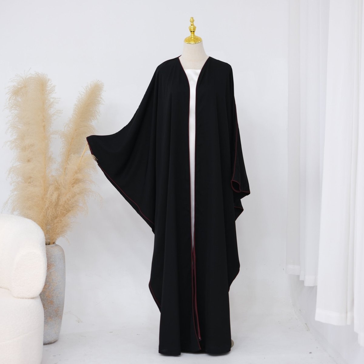 Fourth colourway of contrast piped batwing open abaya full-length view