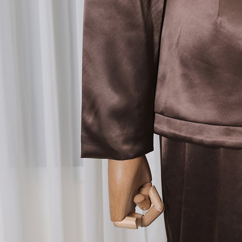Structured peplum top and maxi skirt in warm neutral tones
