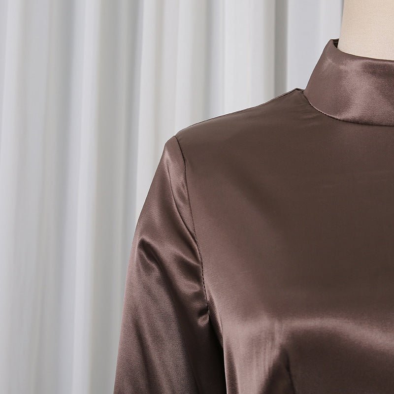 Modest two-piece outfit with corset waist detail and elegant drape
