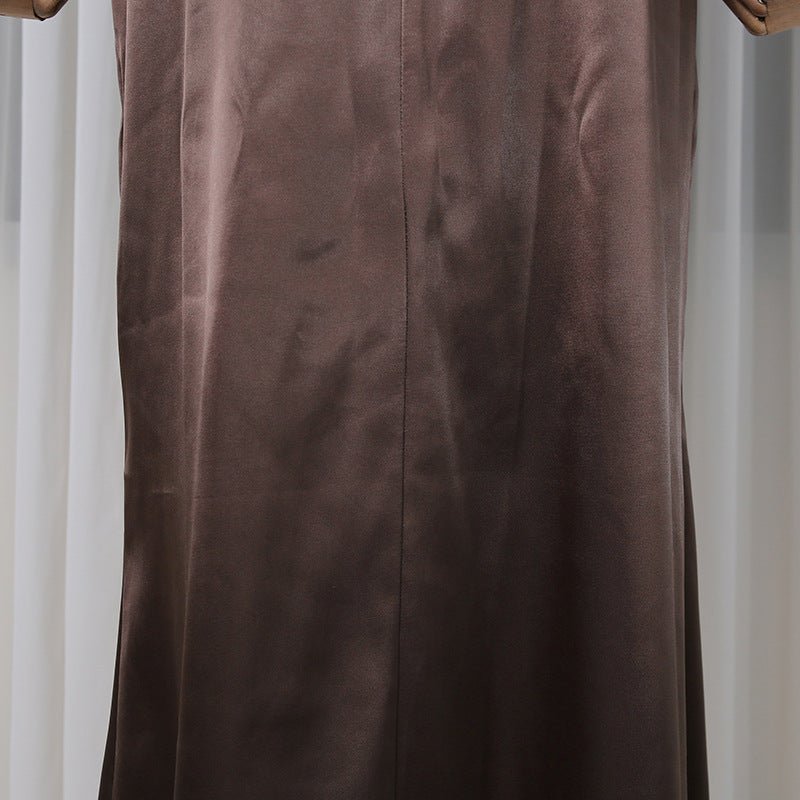 Apricot two-piece with corset-inspired top and floor-length skirt