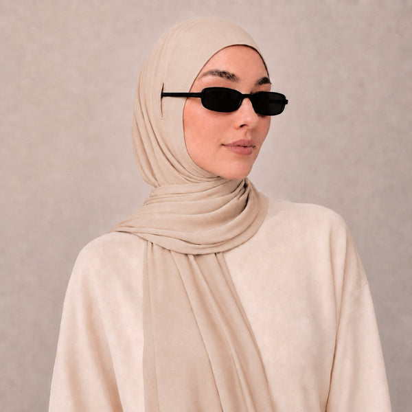 Front view of cotton modal long tail hijab with draped shoulder styling