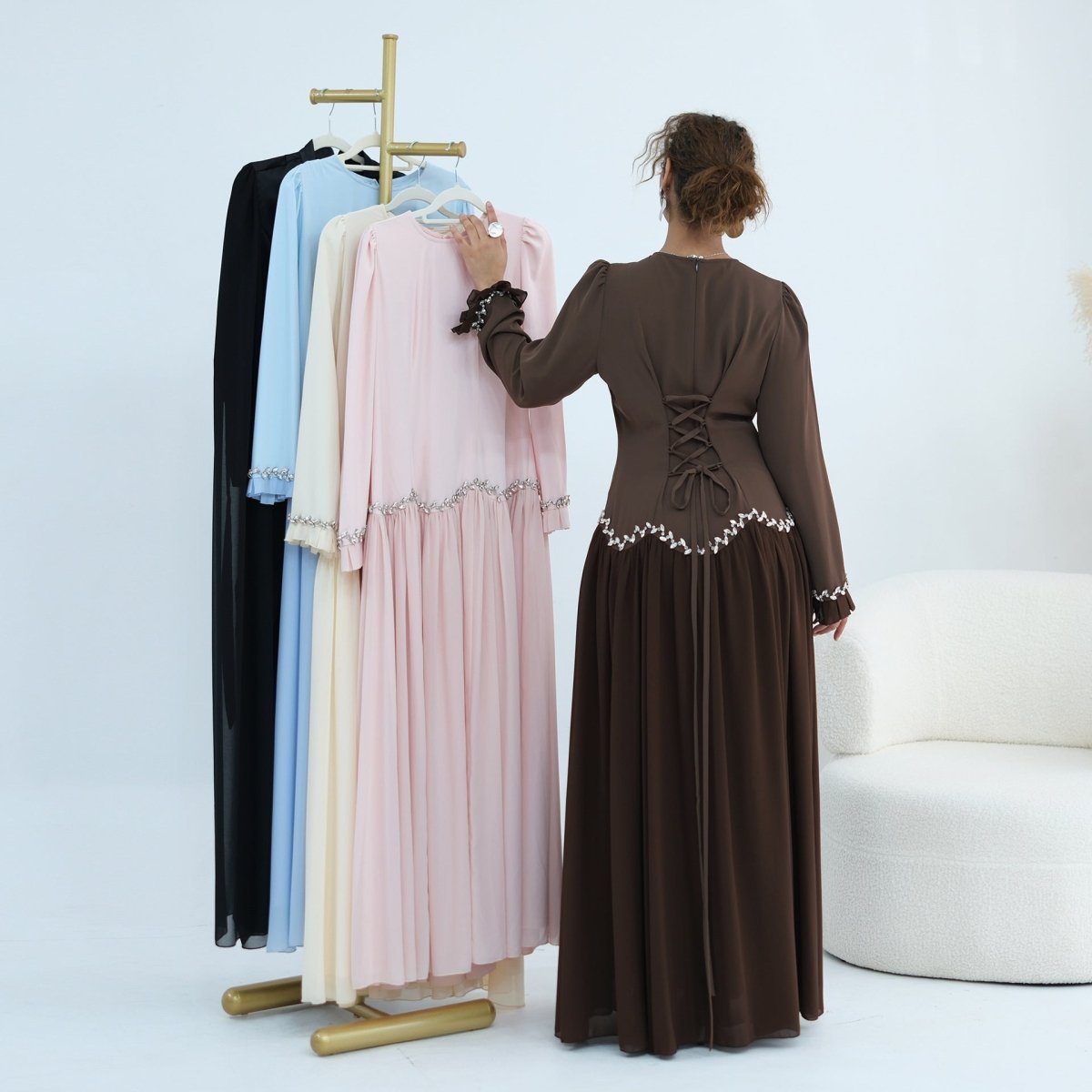 Semi-sheer outer skirt layer flowing in movement