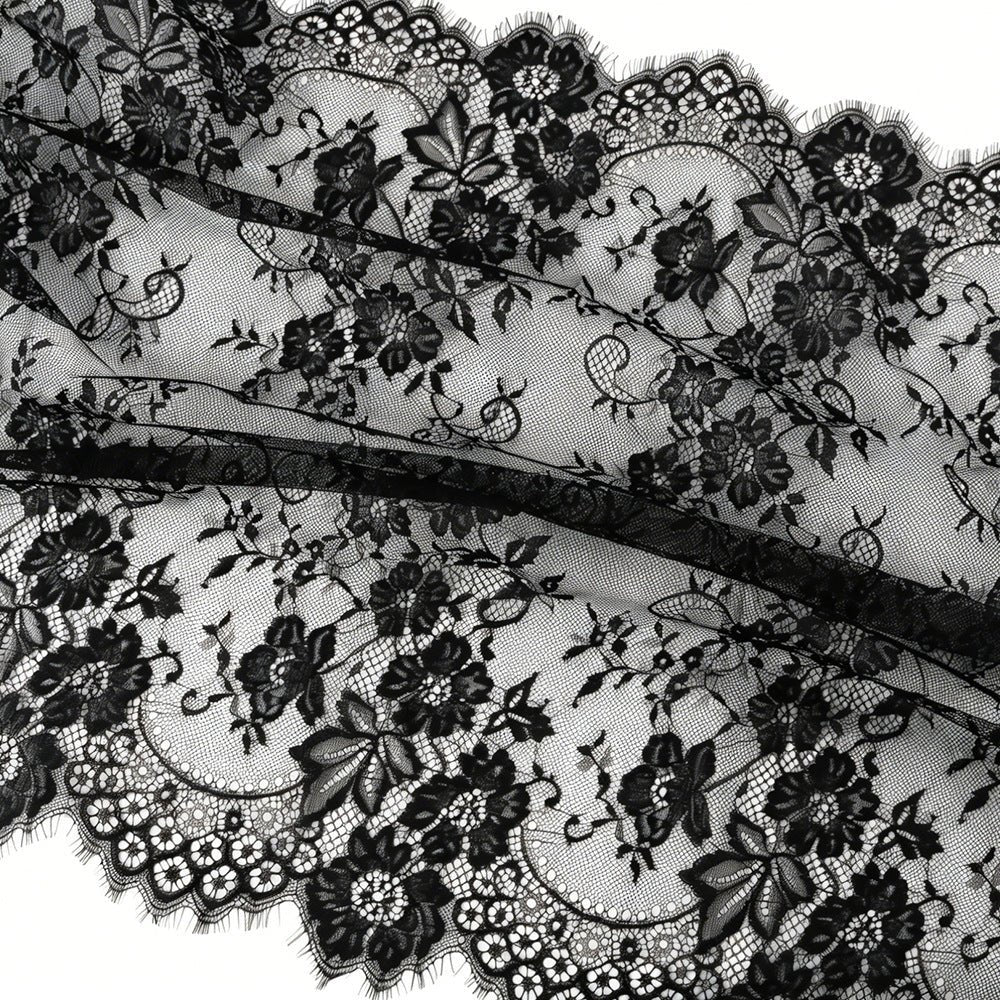Floral and vine lace pattern detail on semi-sheer hijab fabric
