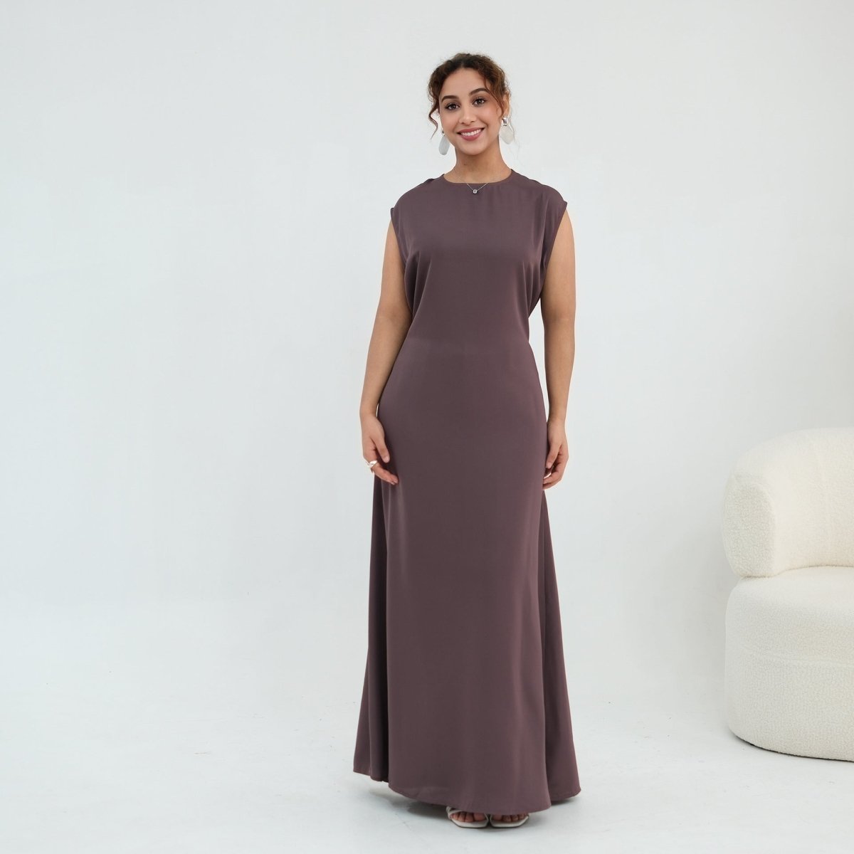 Back tie belt detail on sleeveless inner dress