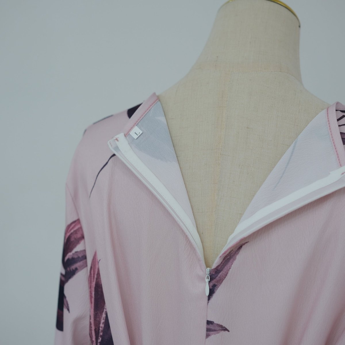 Floor-length hem detail of fully lined modest floral abaya dress