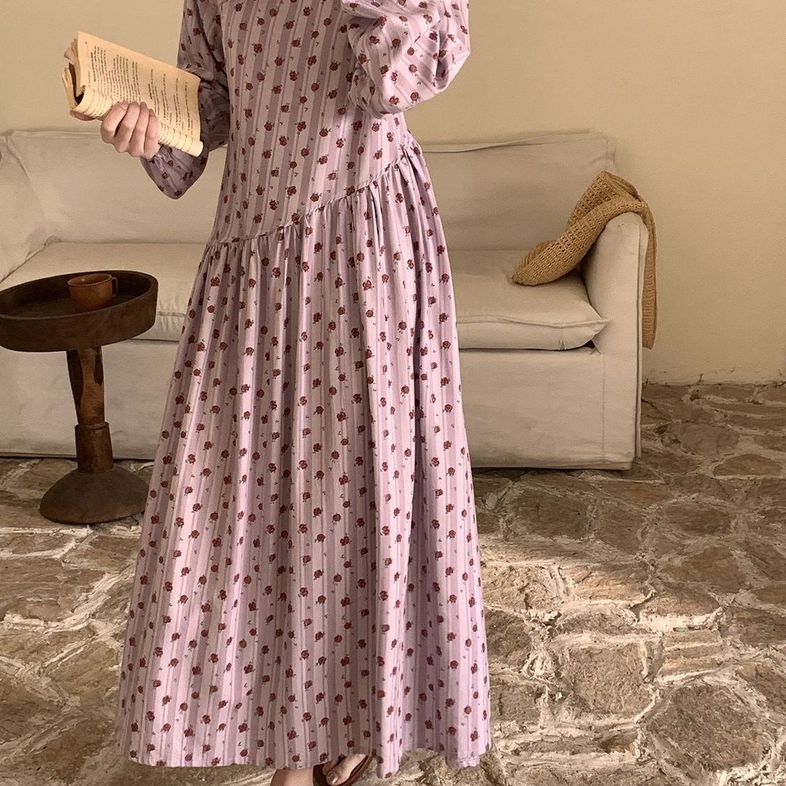 Back view of floral cotton silk dress highlighting self-tie sash bow at waist