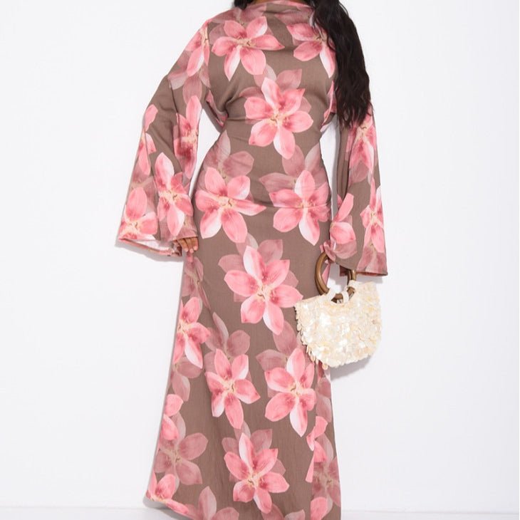 Side view showcasing relaxed drape and flared sleeve