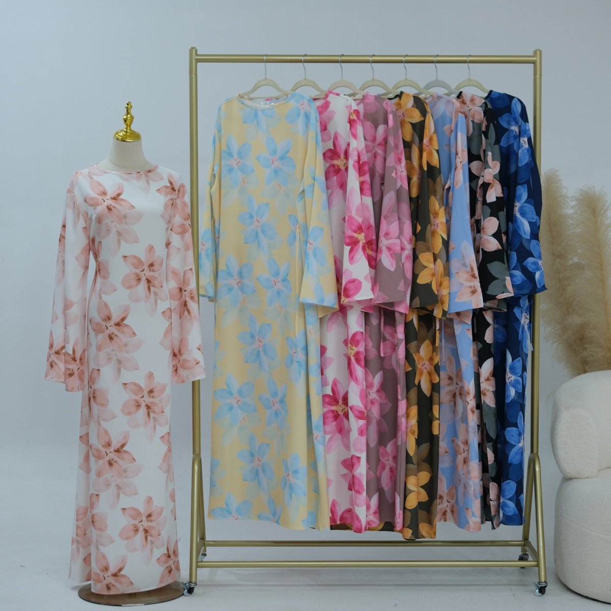 Model styling floral holiday abaya for summer