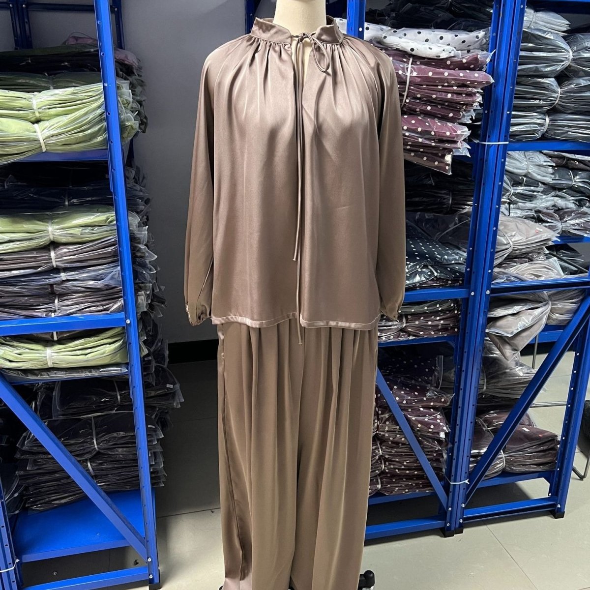 Wide-leg trouser drape in fluid satin-finish fabric