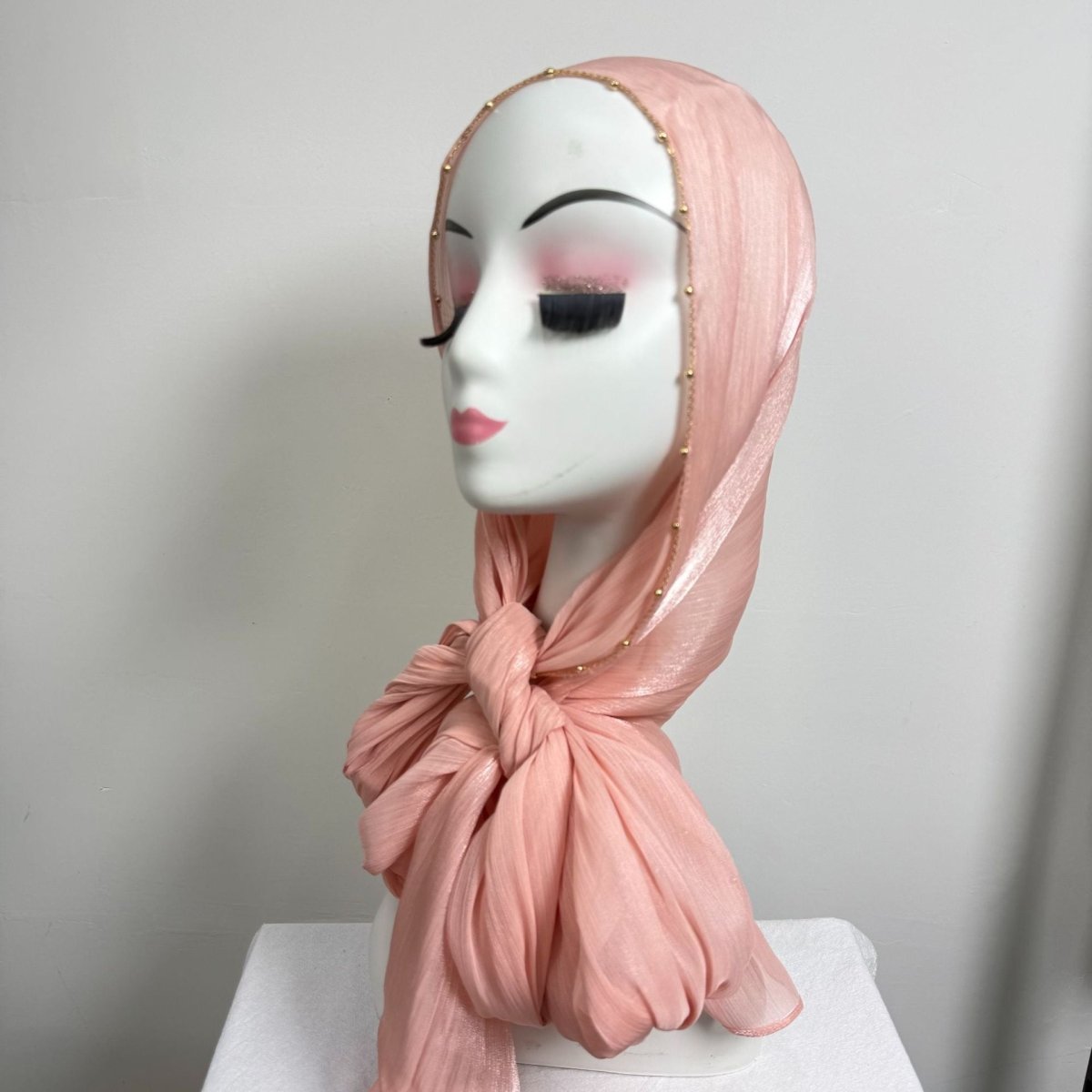 Crinkle satin hijab styled loosely showing volume and dimension