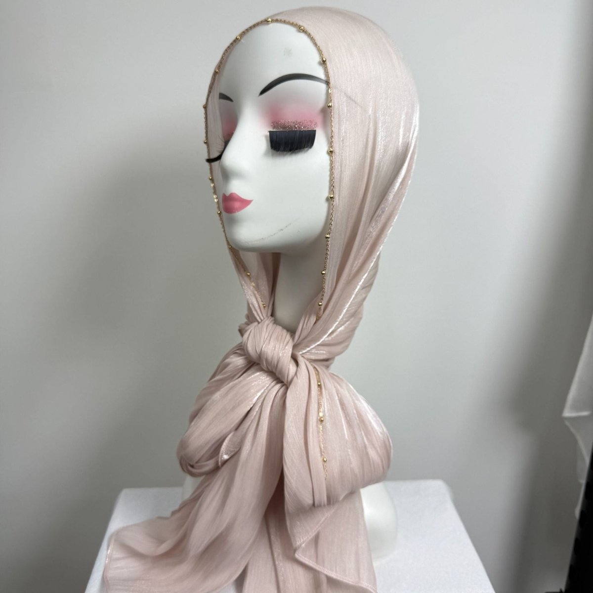 Delicate gold bead detail running along full length of satin hijab edge