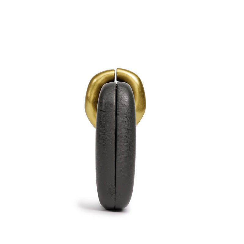 Close-up of gold and silver two-tone metal hardware