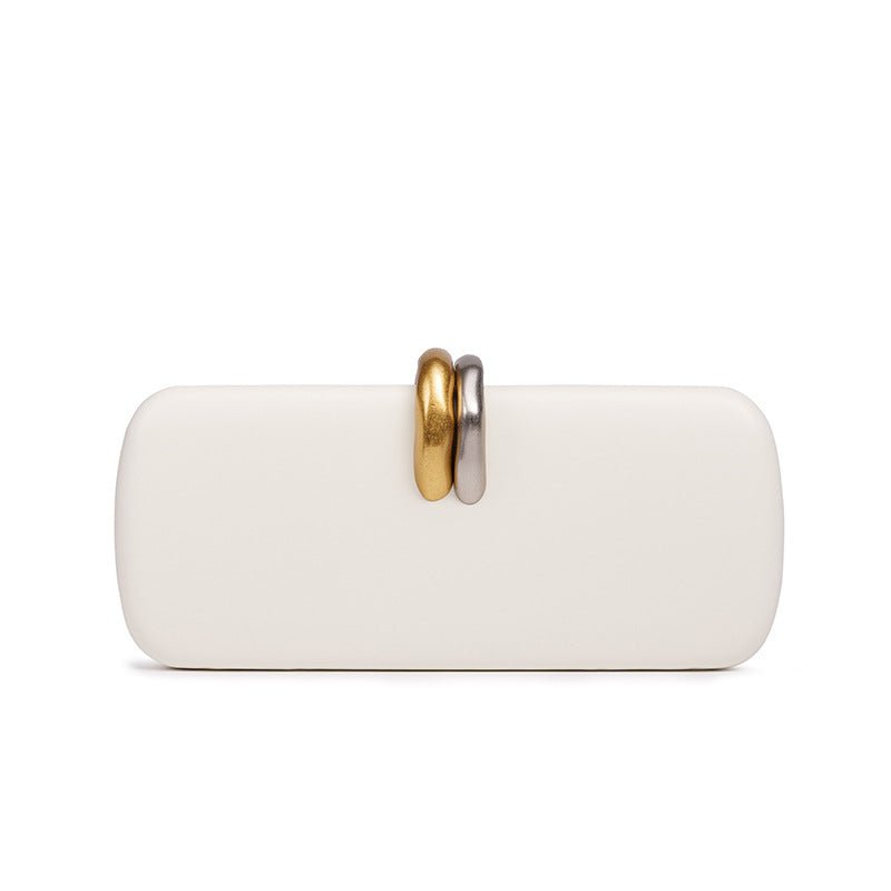 Evening clutch bag styled with modest formal wear