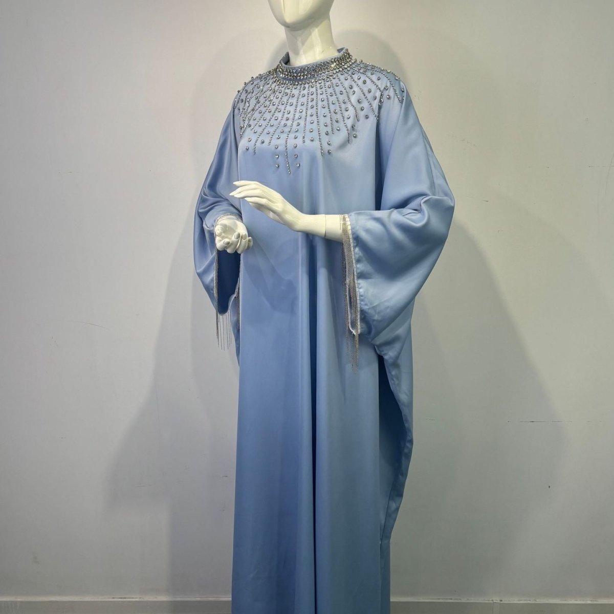 Luxury satin kaftan with dramatic silver chain fringe embellishment