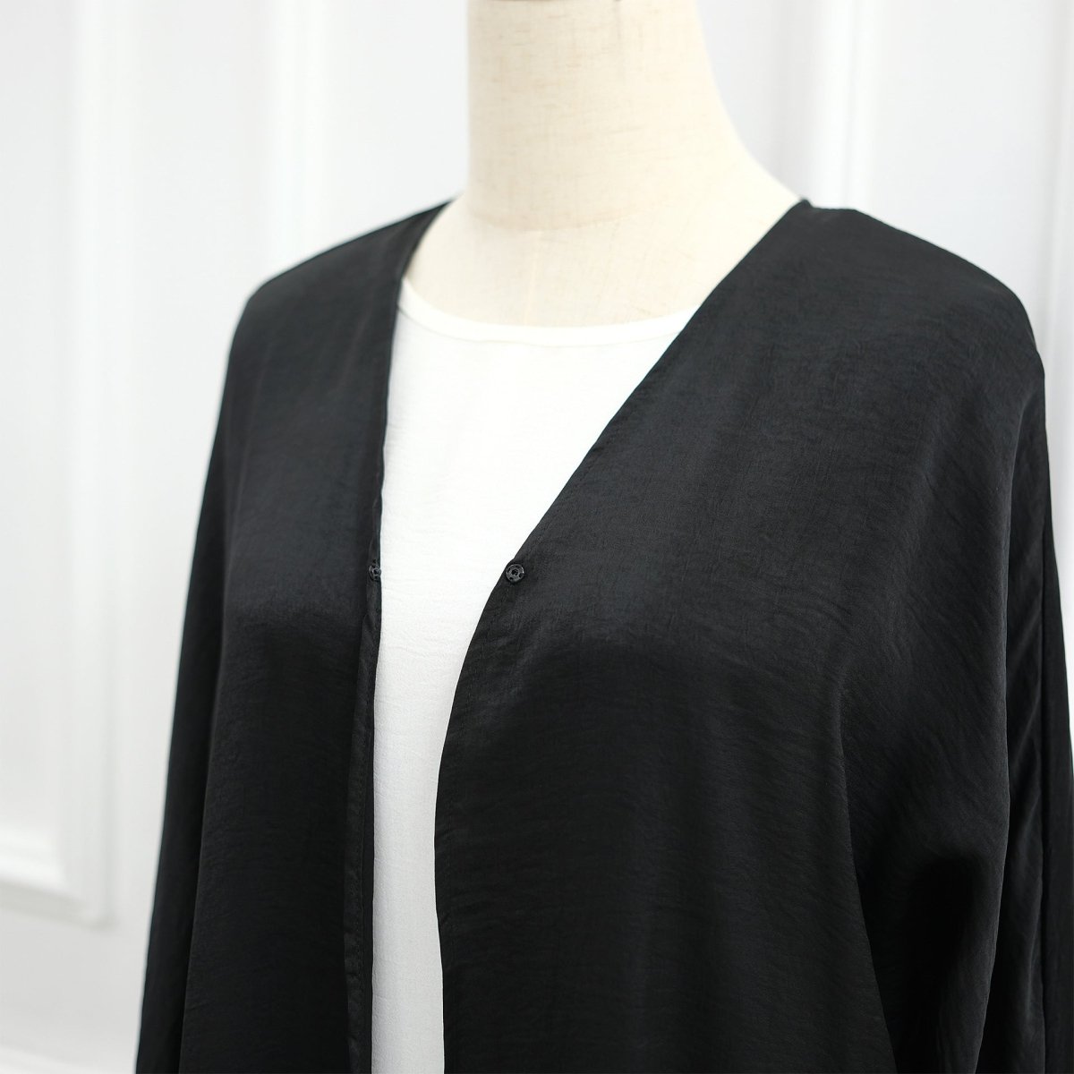 Darker shade of lace cuff open abaya on model