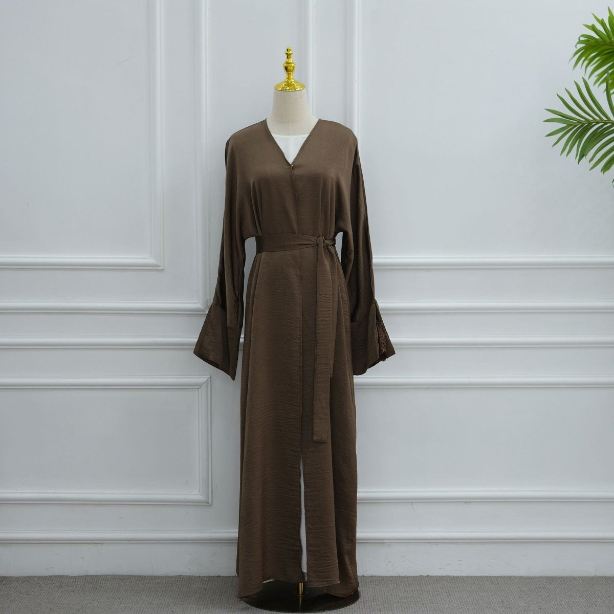 Side profile showing fluid drape of matte crinkle fabric